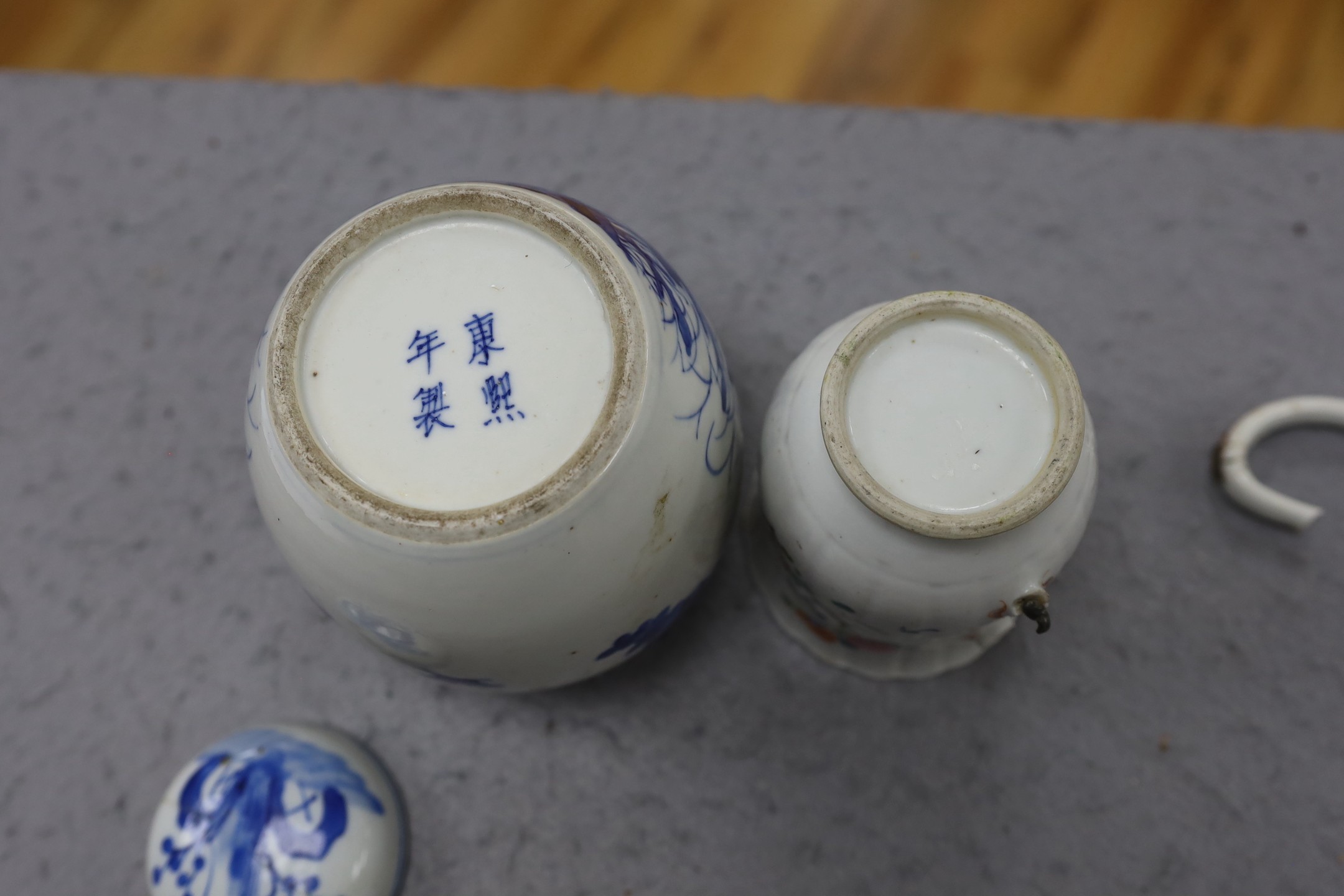 A Chinese blue and white jar and cover, Kangxi mark late 19th century and an 18th century Chinese famille rose mug. 15.5cm high